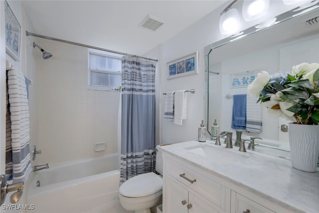 full bathroom featuring vanity, toilet, and shower / bath combo with shower curtain