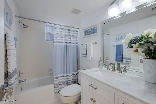 full bathroom with shower / bath combo with shower curtain, vanity, and toilet