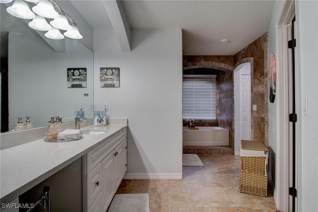 bathroom with vanity and a bathing tub