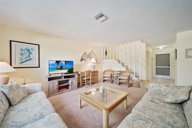 living room with light colored carpet