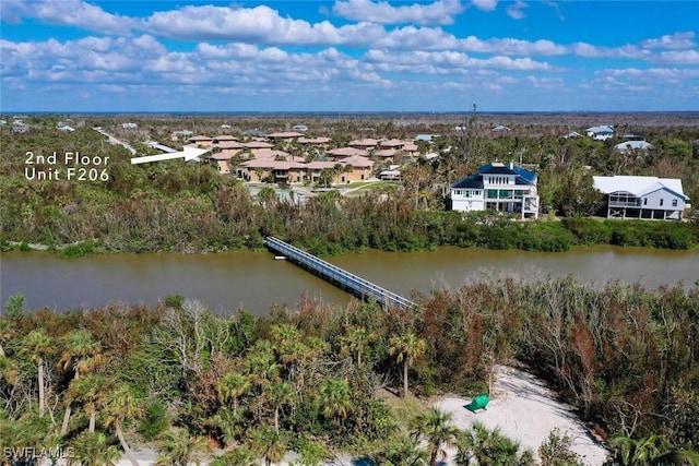 drone / aerial view with a water view