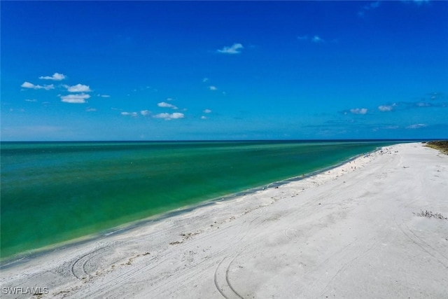 water view featuring a beach view