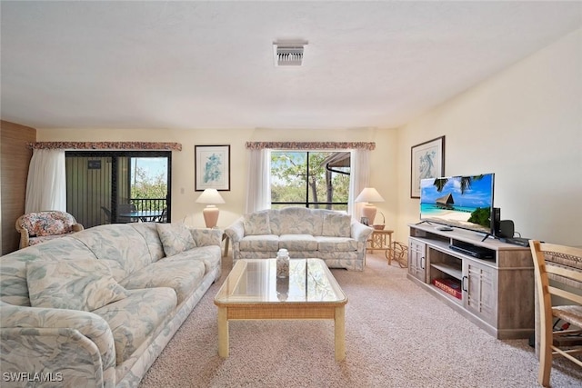 living room with light colored carpet