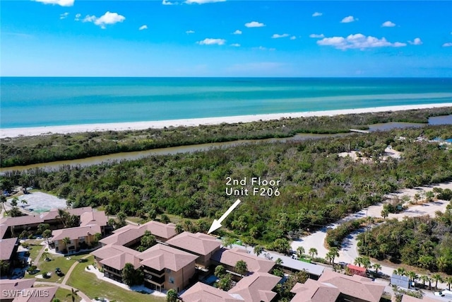 aerial view with a view of the beach and a water view