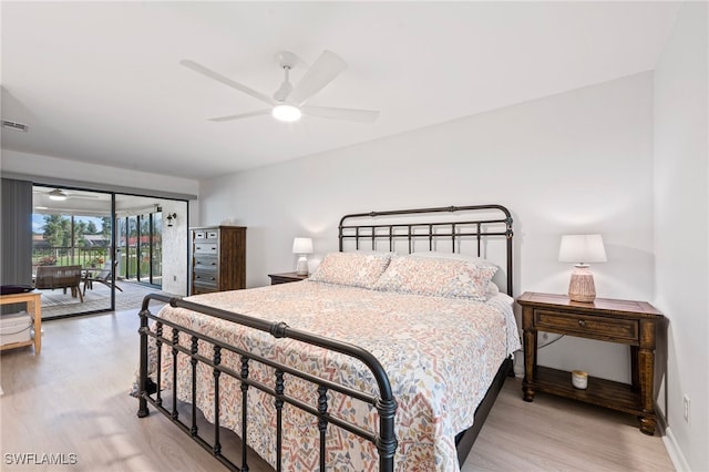 bedroom featuring access to exterior, light hardwood / wood-style flooring, and ceiling fan