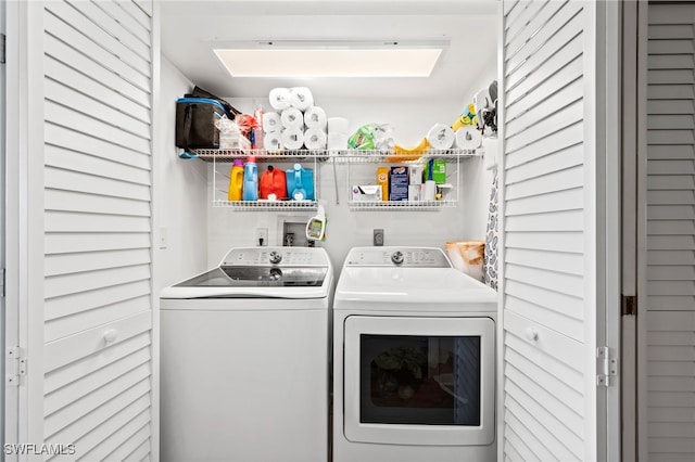 laundry area featuring washing machine and dryer