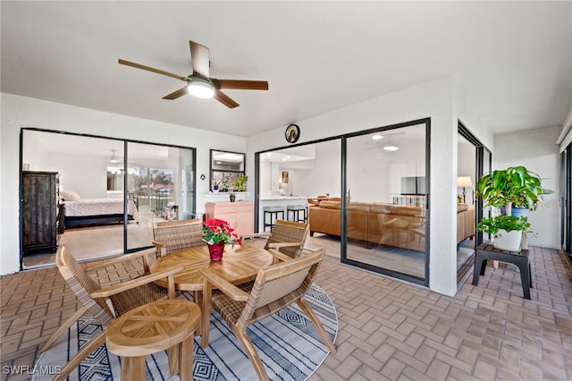 interior space featuring ceiling fan