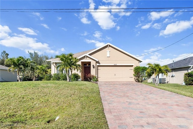 view of front of home featuring a garage, central air condition unit, and a front lawn