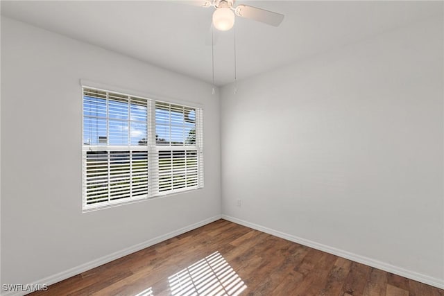 unfurnished room with hardwood / wood-style floors and ceiling fan