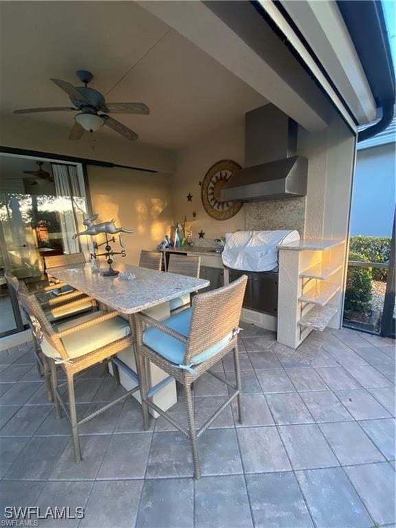 view of patio / terrace featuring ceiling fan