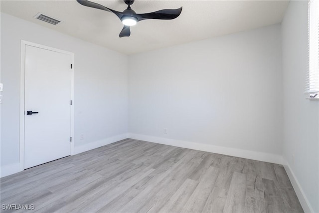 unfurnished room featuring ceiling fan and light hardwood / wood-style flooring