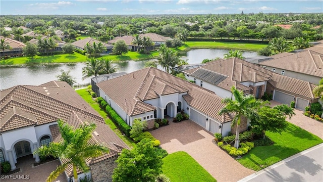 birds eye view of property featuring a water view