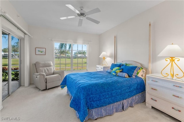 bedroom with ceiling fan, access to outside, and light carpet