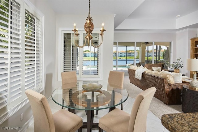 dining room featuring light tile patterned floors and an inviting chandelier