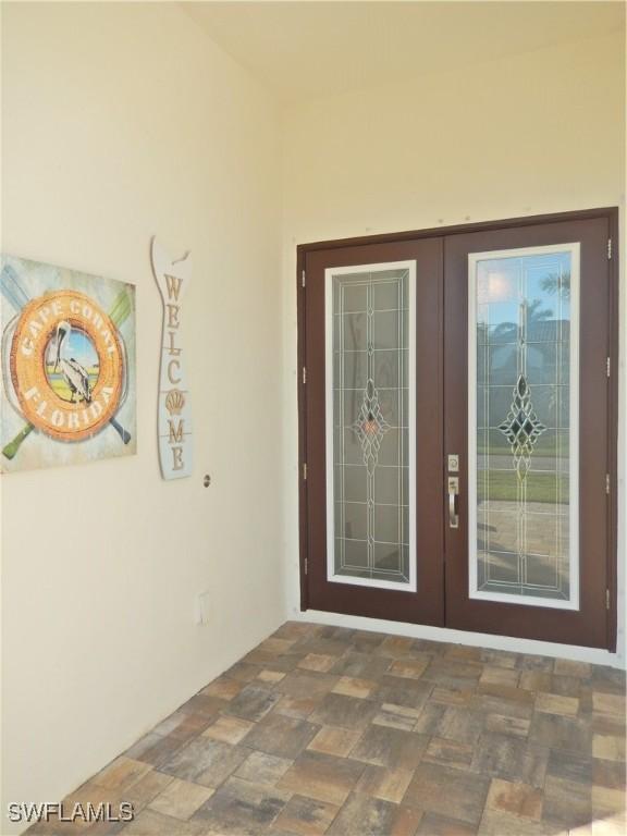 property entrance with french doors