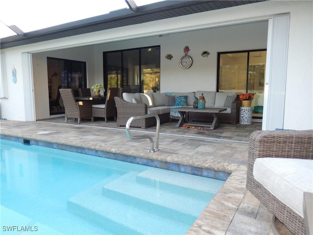 view of pool featuring an outdoor hangout area and a patio area