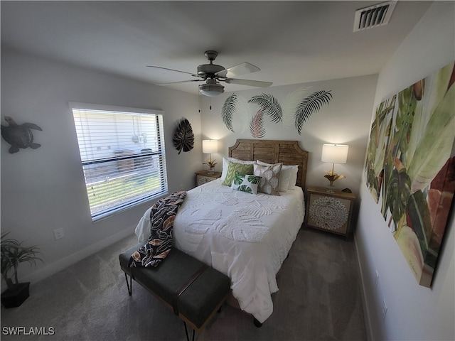 bedroom featuring ceiling fan and dark colored carpet