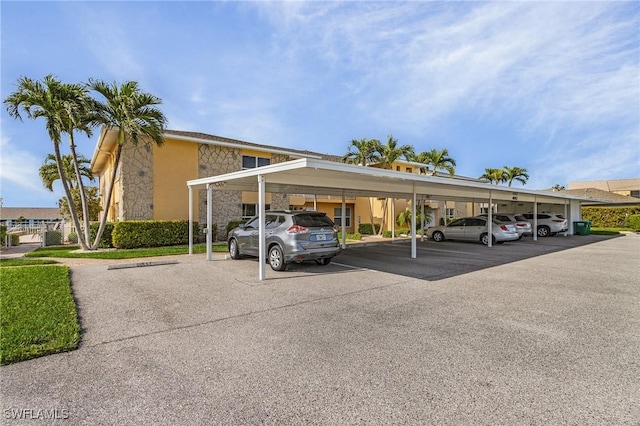 view of parking featuring a carport