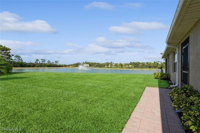 view of yard with a water view