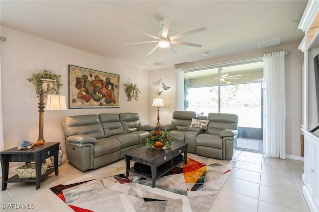 living room featuring ceiling fan and light tile patterned flooring