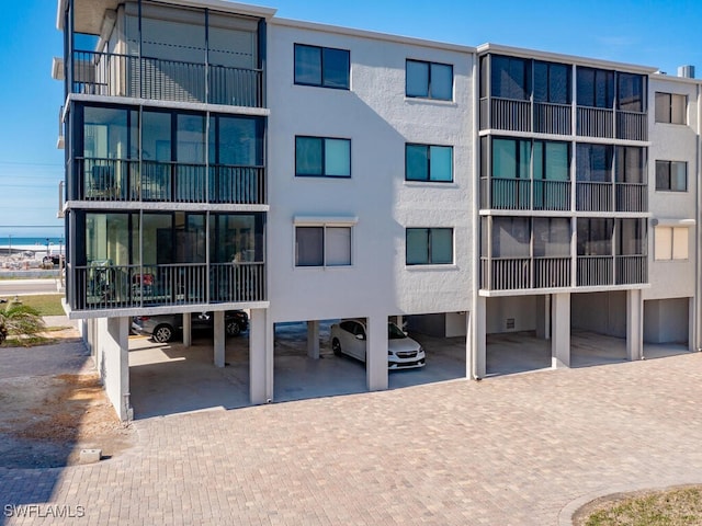 view of building exterior with a water view