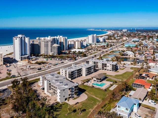 drone / aerial view with a view of the beach and a water view