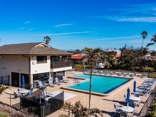 view of pool featuring a patio area