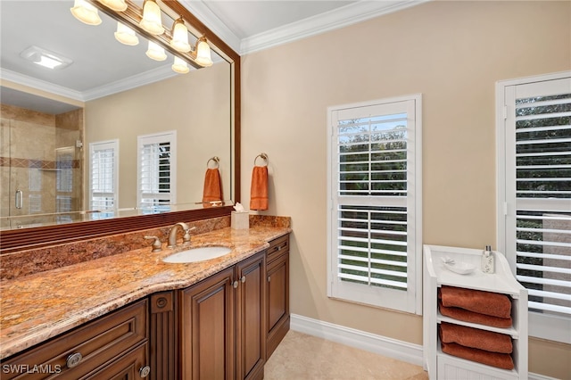 bathroom featuring tile patterned flooring, vanity, walk in shower, and ornamental molding