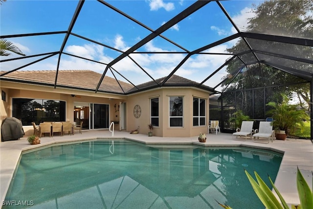 view of pool featuring a patio and a lanai