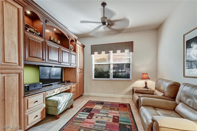 office featuring ceiling fan and light tile patterned floors