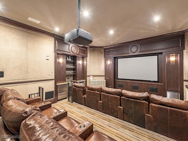 cinema with wood walls and ornamental molding