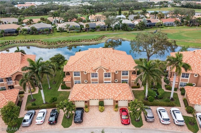 drone / aerial view with a water view