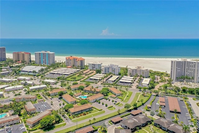 aerial view with a beach view and a water view