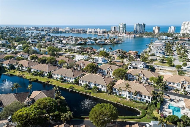 drone / aerial view with a water view