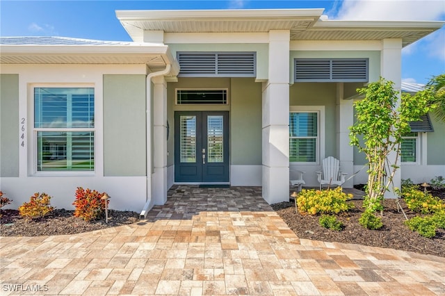 entrance to property with french doors