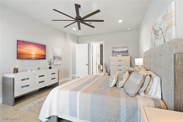 bedroom with ceiling fan and ensuite bath