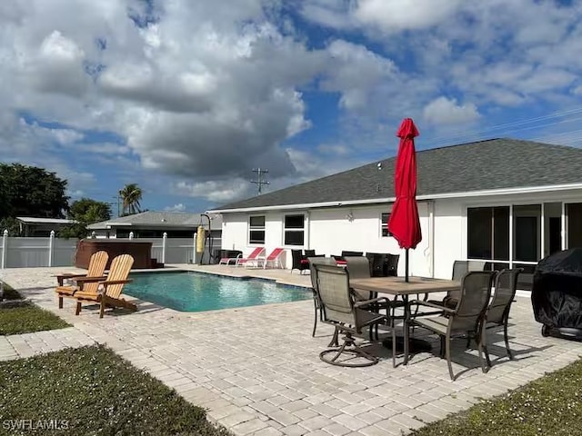 view of swimming pool featuring a patio