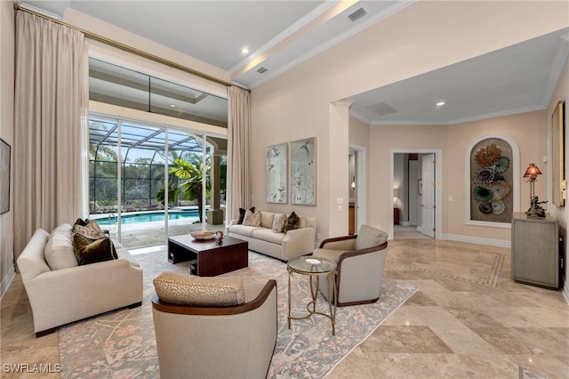 living room featuring crown molding