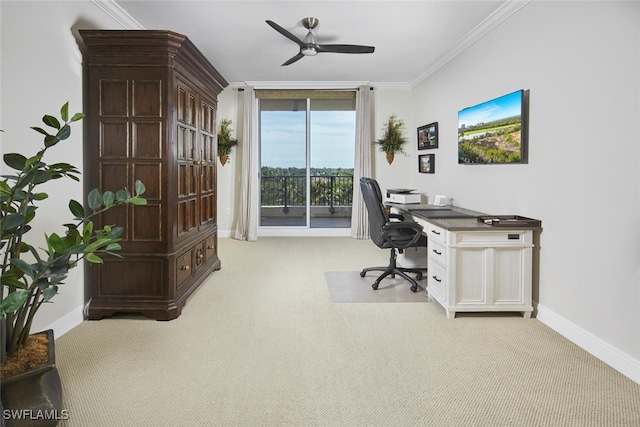 office area with ceiling fan, ornamental molding, and light colored carpet