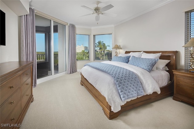 bedroom featuring crown molding, ceiling fan, and light colored carpet