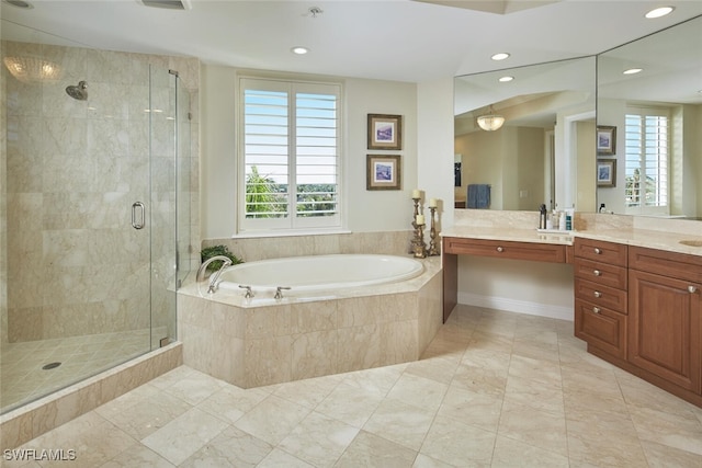 23850 Via Italia Cir Unit 406, Estero, FL 34134 - bathroom with recessed lighting, a shower stall, tile patterned floors, vanity, and a bath
