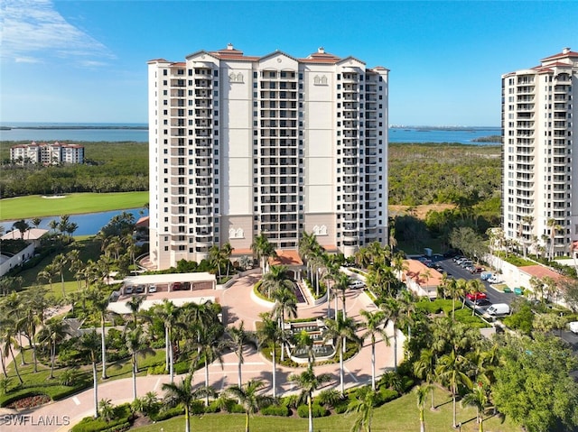 view of building exterior featuring a water view