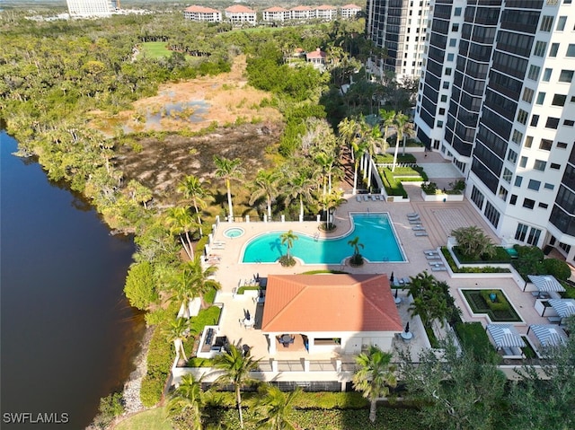 birds eye view of property with a water view