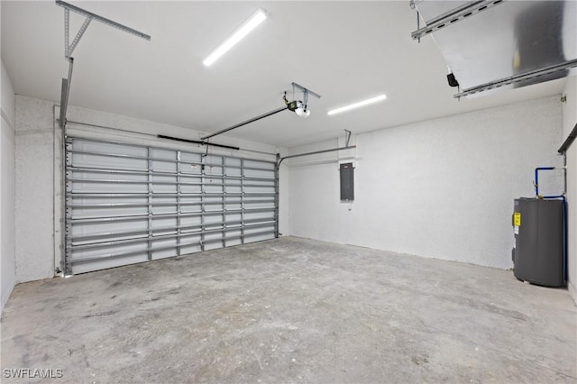 garage featuring electric panel, water heater, and a garage door opener