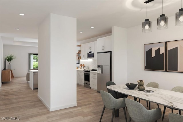 dining area featuring light hardwood / wood-style flooring