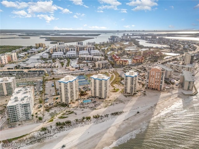 aerial view featuring a water view and a view of the beach