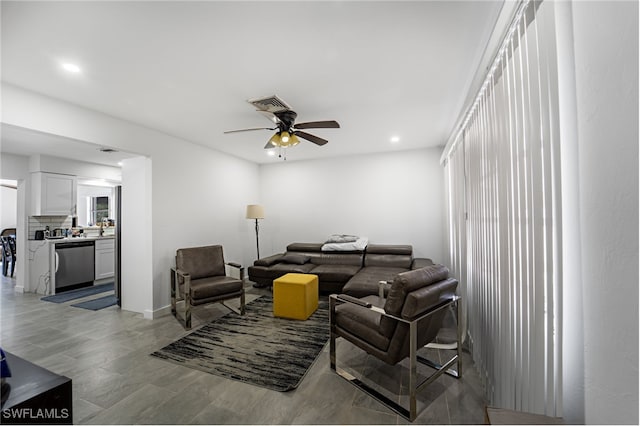 living room featuring ceiling fan