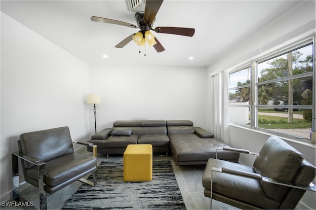 living room featuring ceiling fan