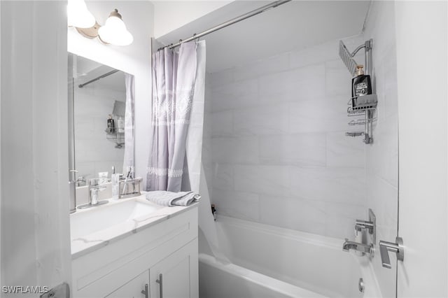 bathroom featuring shower / tub combo with curtain and vanity