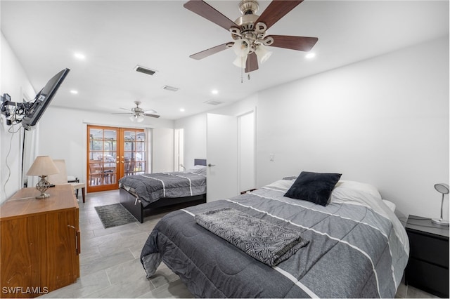 bedroom featuring ceiling fan and french doors